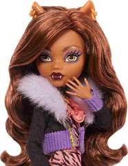 Doll features a ruffled skirt and faux fur jacket for dramatic display.