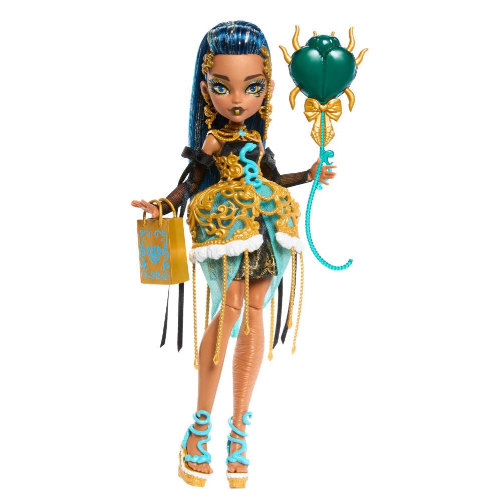 Monster High Cleo De Nile in golden party dress, ideal for imaginative play.