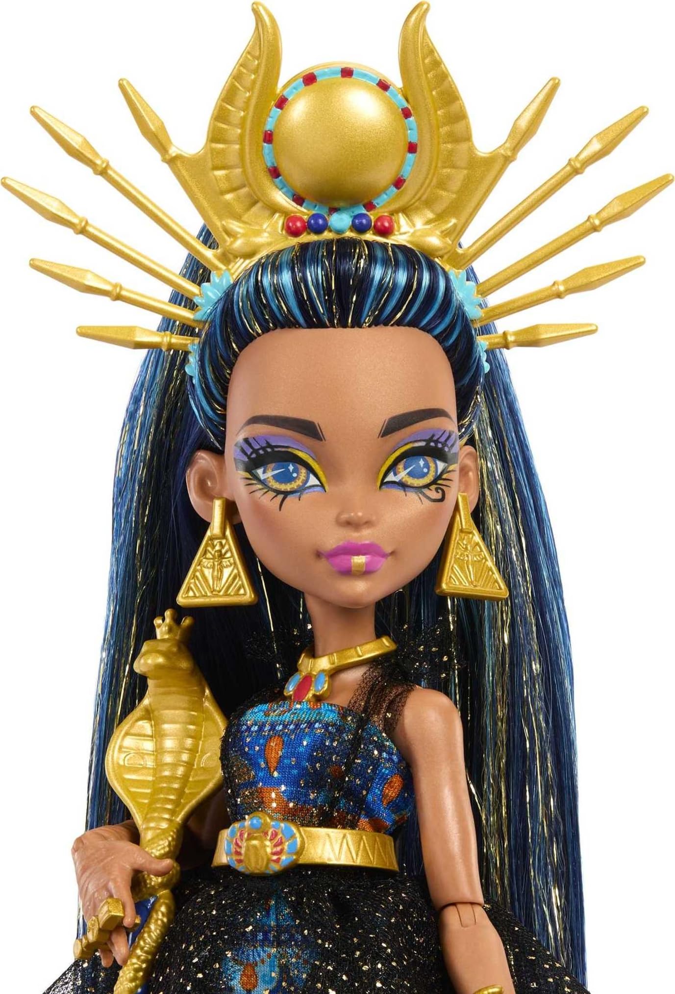 Cleo De Nile's Eye of Horus handbag opens to reveal a pyramid compact for storytelling.