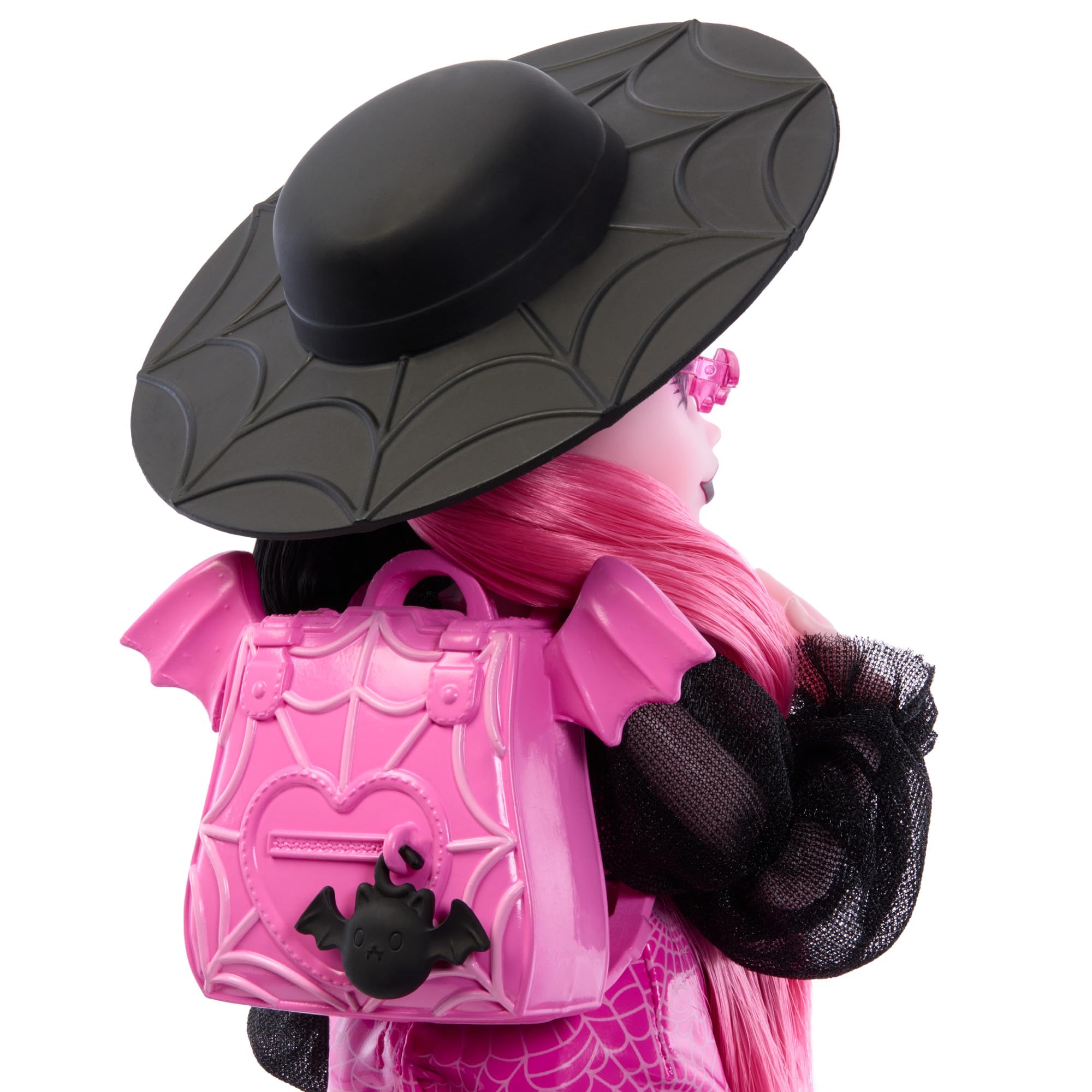 Monster High Draculaura pink-and-black outfit highlights vibrant fashion for creative play