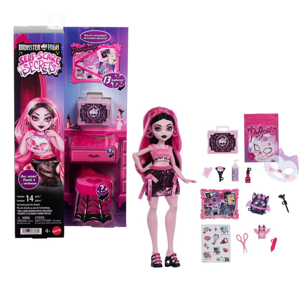 Monster High Draculaura Self-Scare doll using a face roller for pretend skincare play