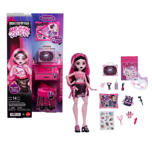 Monster High Draculaura Self-Scare doll using a face roller for pretend skincare play