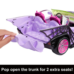 Monster High Ghoul Mobile interior shows batwing-shaped seatbelts for spooky safety-themed play