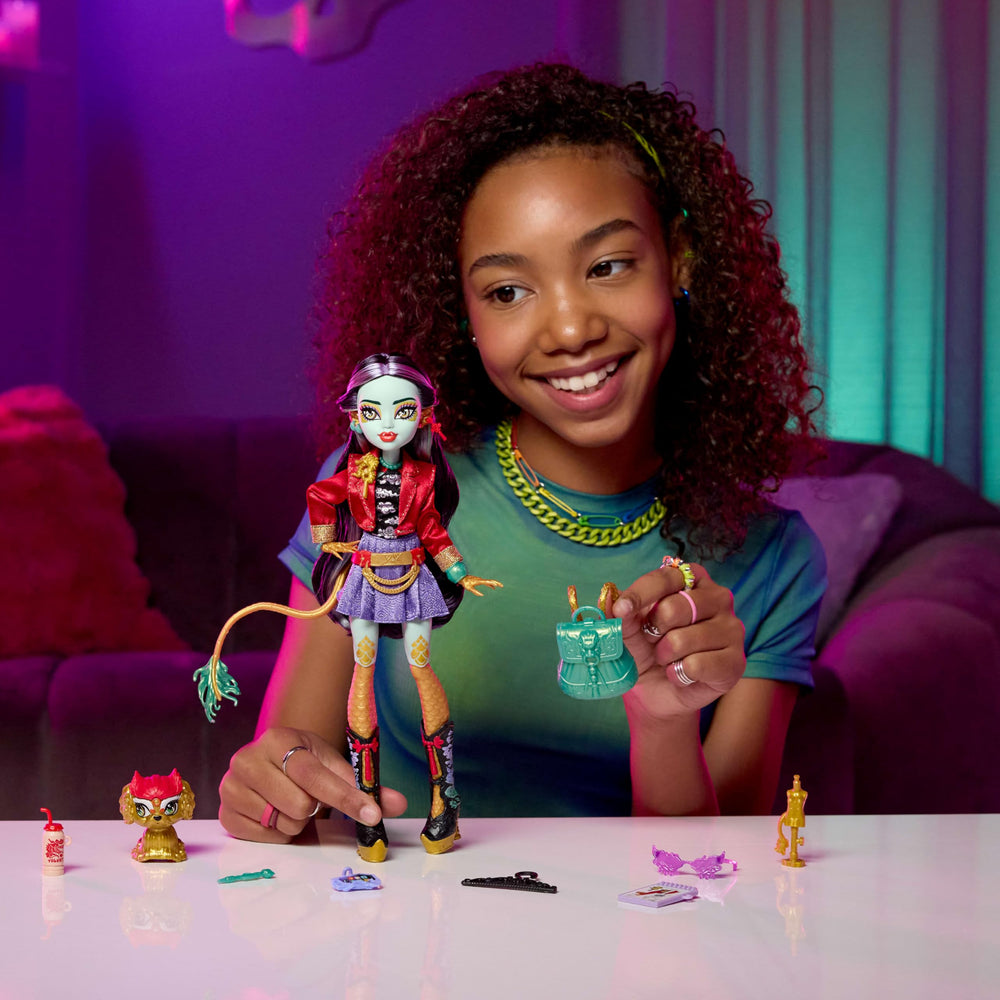 Monster High Jinafire Long doll with yogurt drink to spark snack-time storytelling.