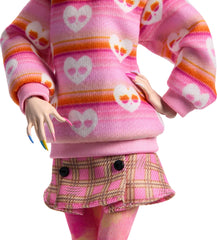 Monster High Enid Sinclair doll with highlighted hair and colorful claws for vibrant display.