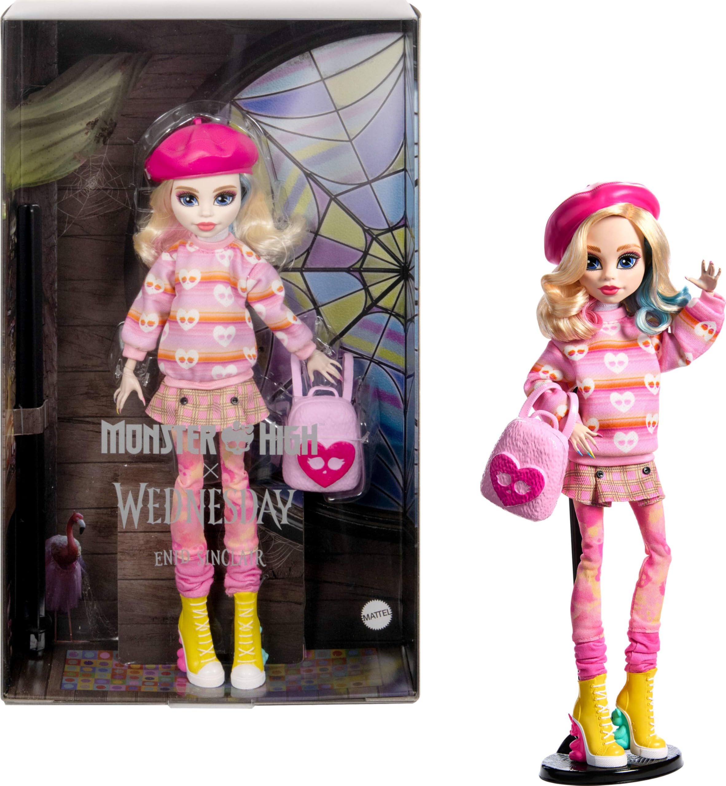 Monster High Enid Sinclair doll in pink with beret and backpack for display and storytelling.
