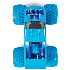 Monster Jam Blue Thunder working suspension cushions landings during high-action stunts.