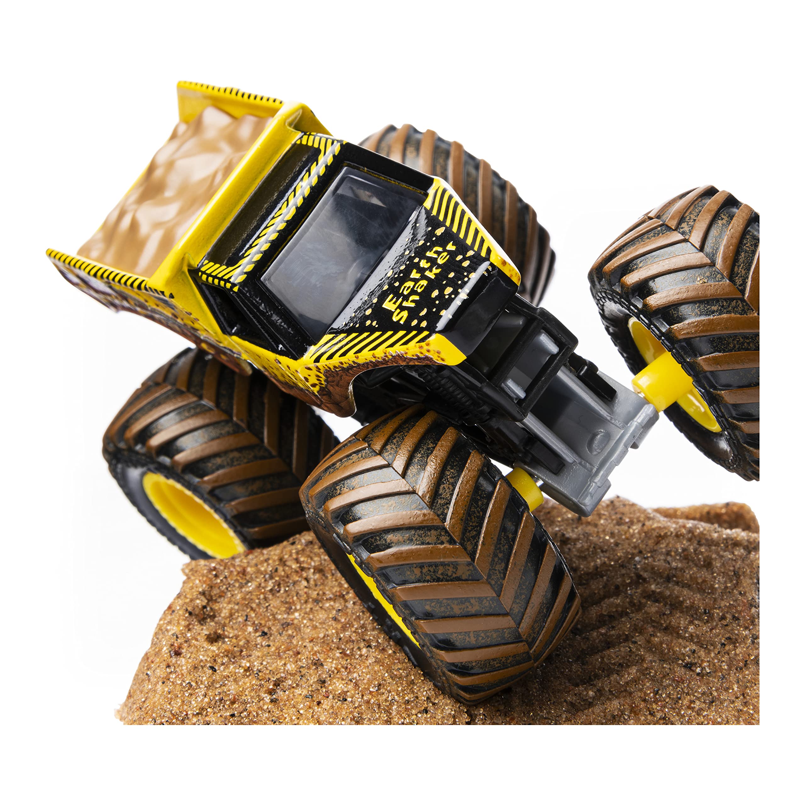 Monster Jam dirt-stained BKT tires add realism to the Earth Shaker truck.