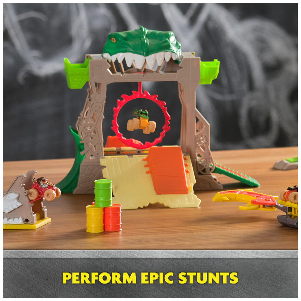 Kids performing front flips and ring-of-fire stunts on the playset.