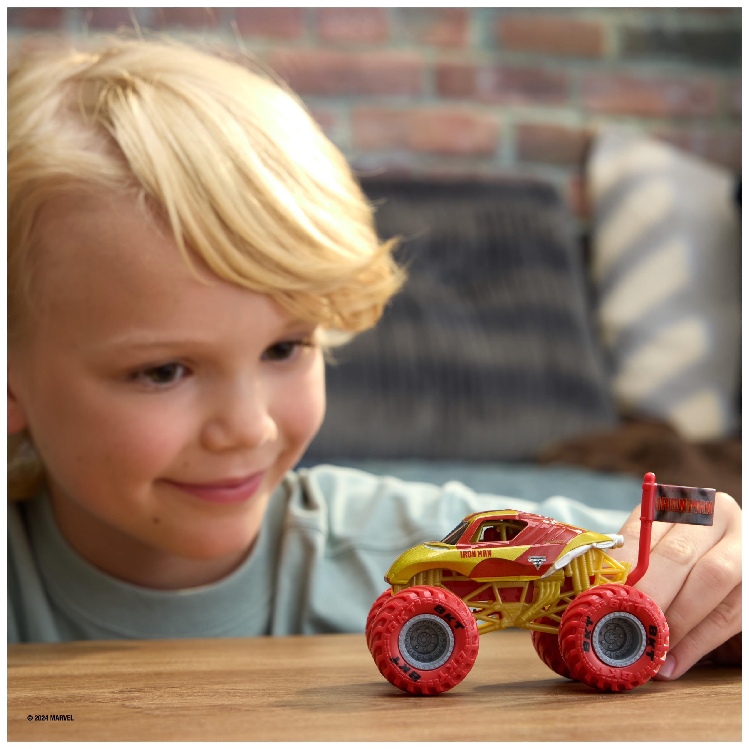 Monster Jam Marvel Iron Man truck rear view, bold decals for action-ready collectibles