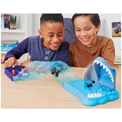 Monster Jam playset side view showing two exclusive trucks for imaginative racing fun