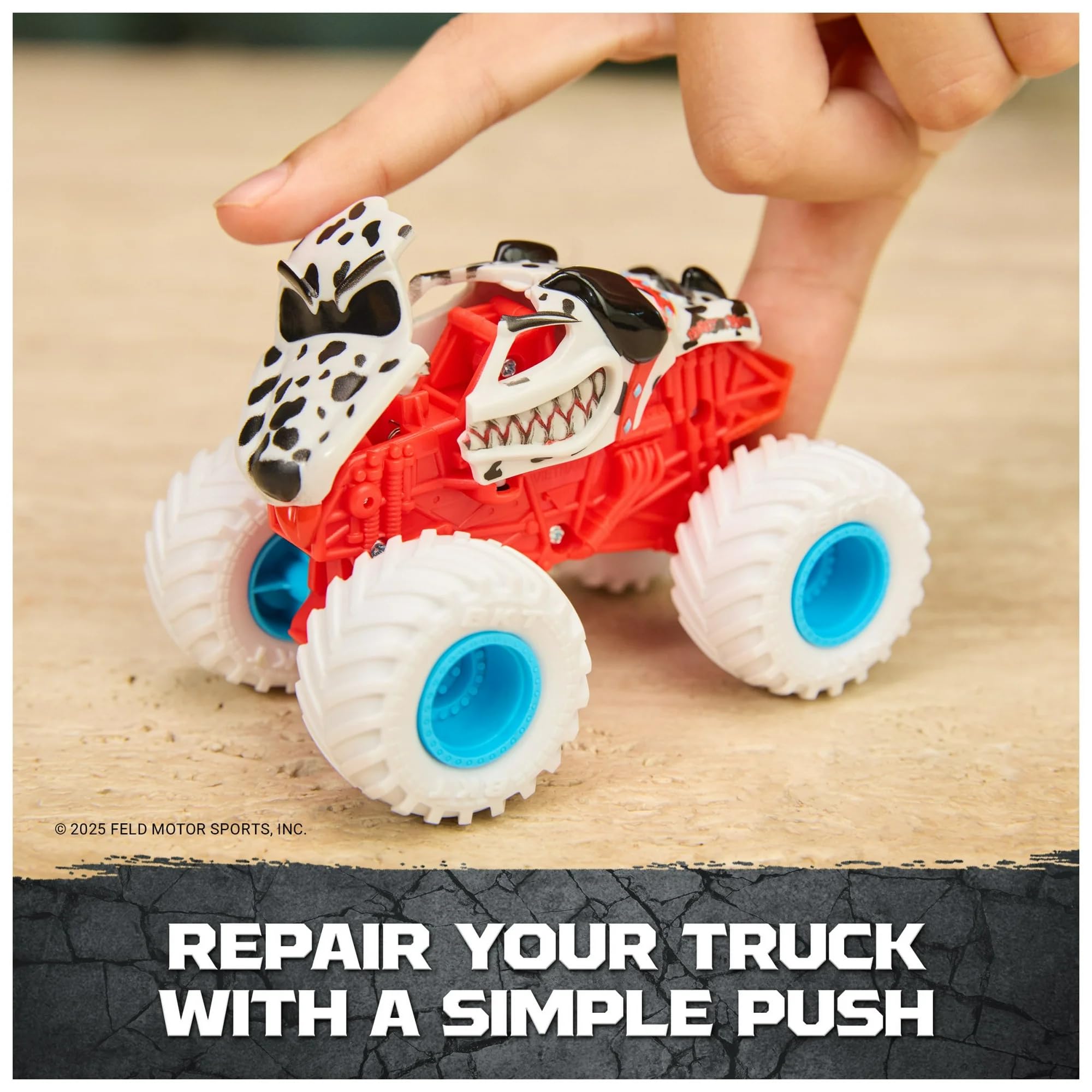 Monster Jam Mutt Dalmatian tires with blue hubs support stable indoor and outdoor rolling.