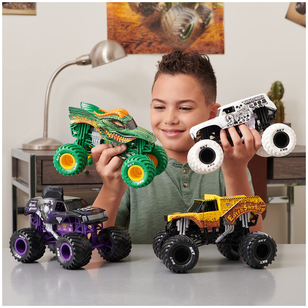 Monster Jam Son-uva Digger 1:24 tires close-up showcasing rubber BKT traction.