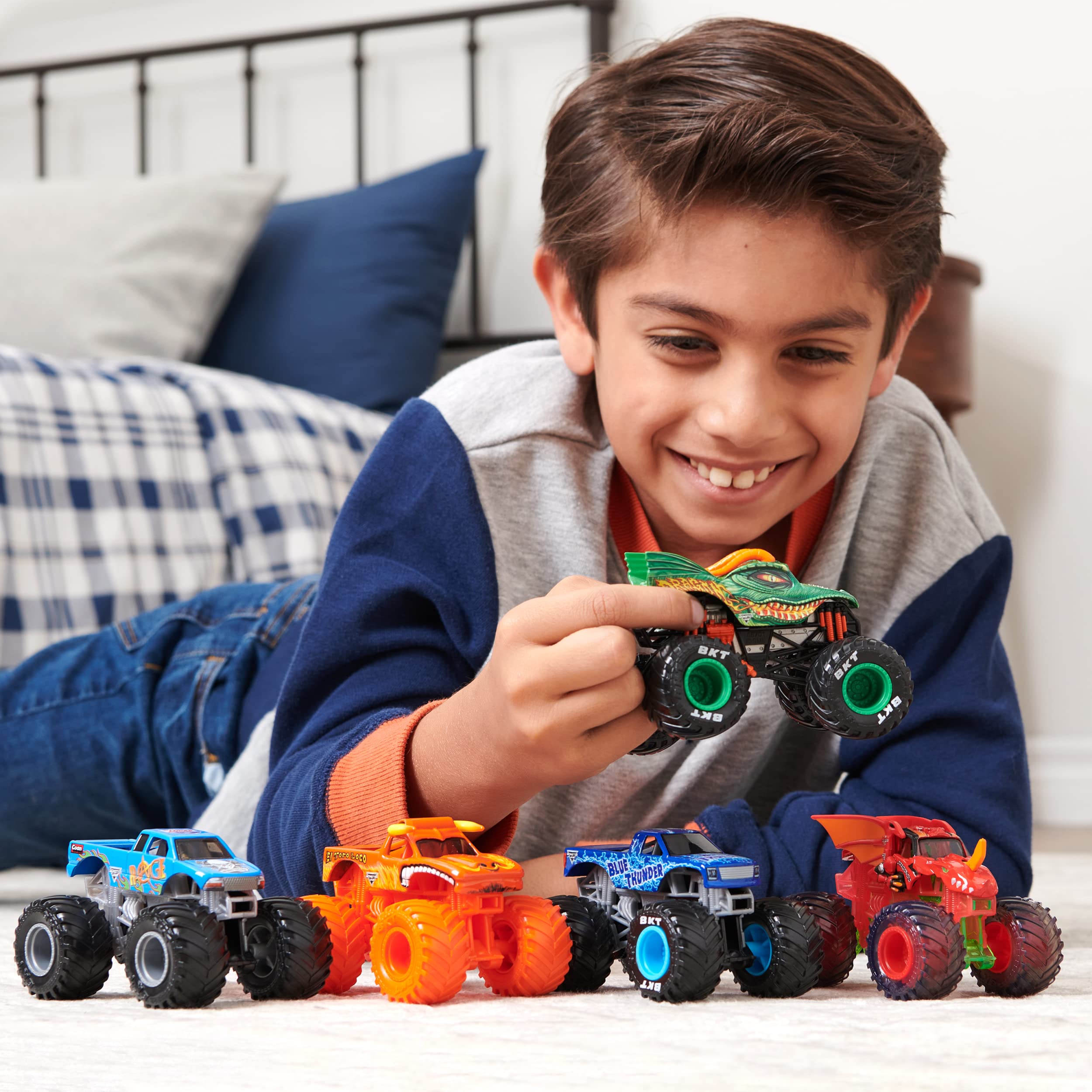 Monster Jam Sparkle Smash truck side view showing chrome rims for collectible appeal