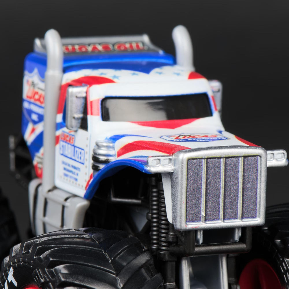 Monster Jam Earth Shaker 1:64 truck with powerful design for shelves.