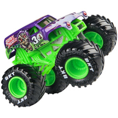 Monster Jam stylized rims and chassis capture the truck’s signature swagger during action play.