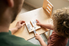 Montessori & Me wooden puzzle blocks support early literacy through animal matching and sounds