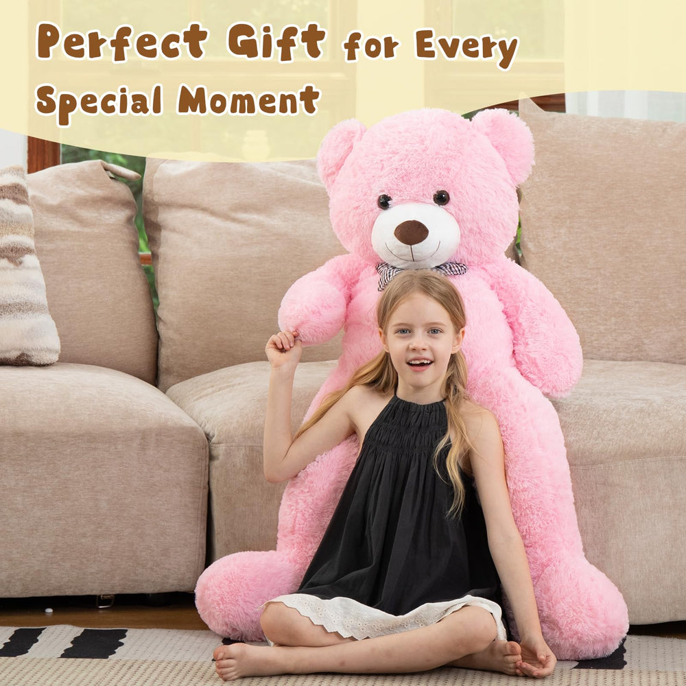 MorisMos pink giant teddy bear ready for a big hug during bedtime.