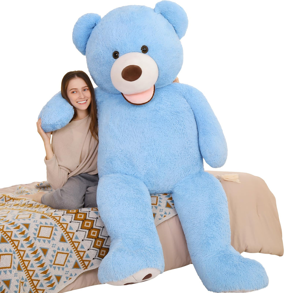 MorisMos giant blue teddy bear enhances room decor with soft comforting presence