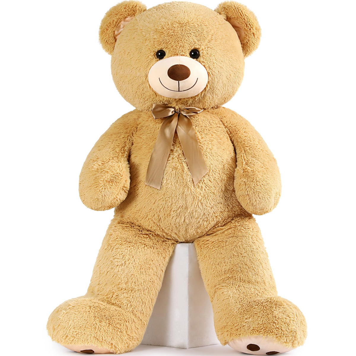 MorisMos giant teddy bear in full view offers a comforting, huggable presence for kids and loved ones.