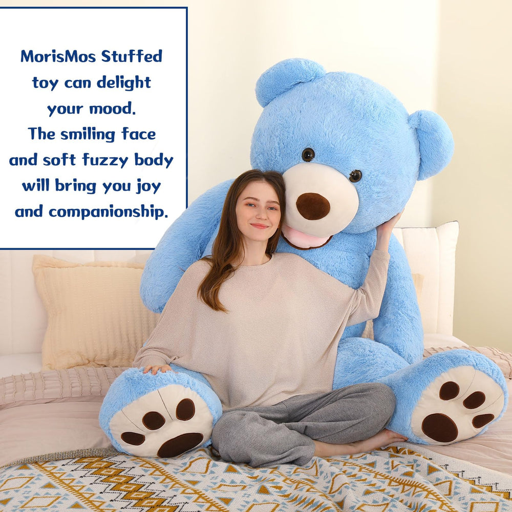 MorisMos 6ft teddy bear in a bedroom for warm, inviting decor.