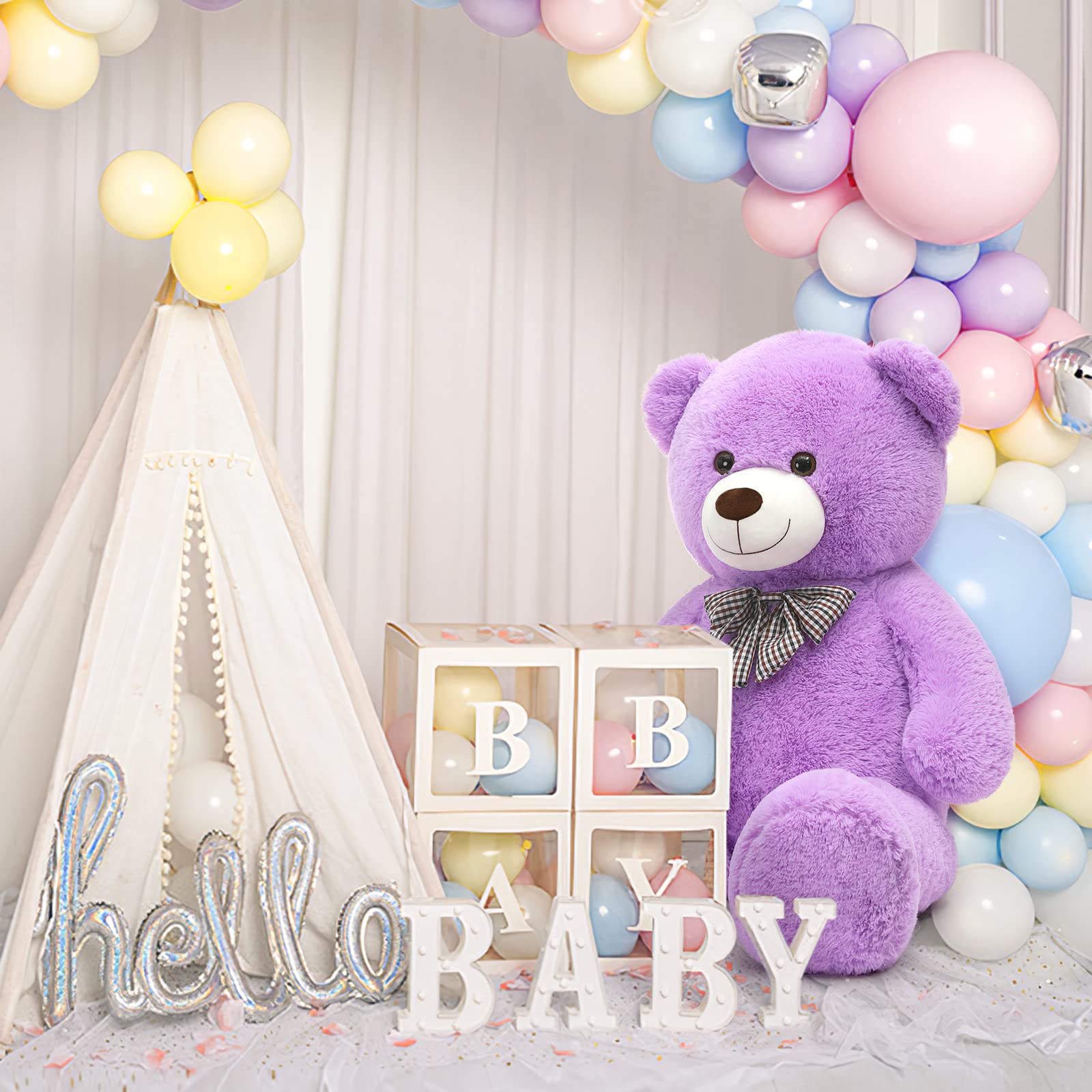MorisMos giant teddy bear beside a child inviting gentle hugs before sleep.