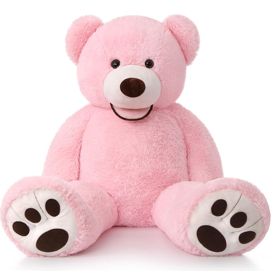 MorisMos Smile Giant Teddy Bear, 51 inches tall, makes a warm room centerpiece.