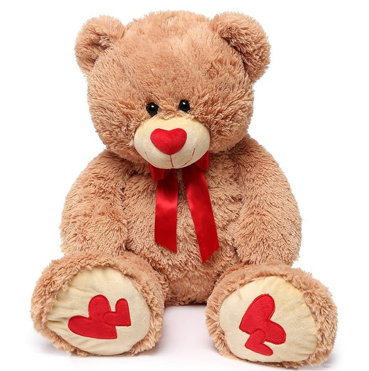 MorisMos teddy bear with bow tie close-up highlighting playful charm and premium stitching.
