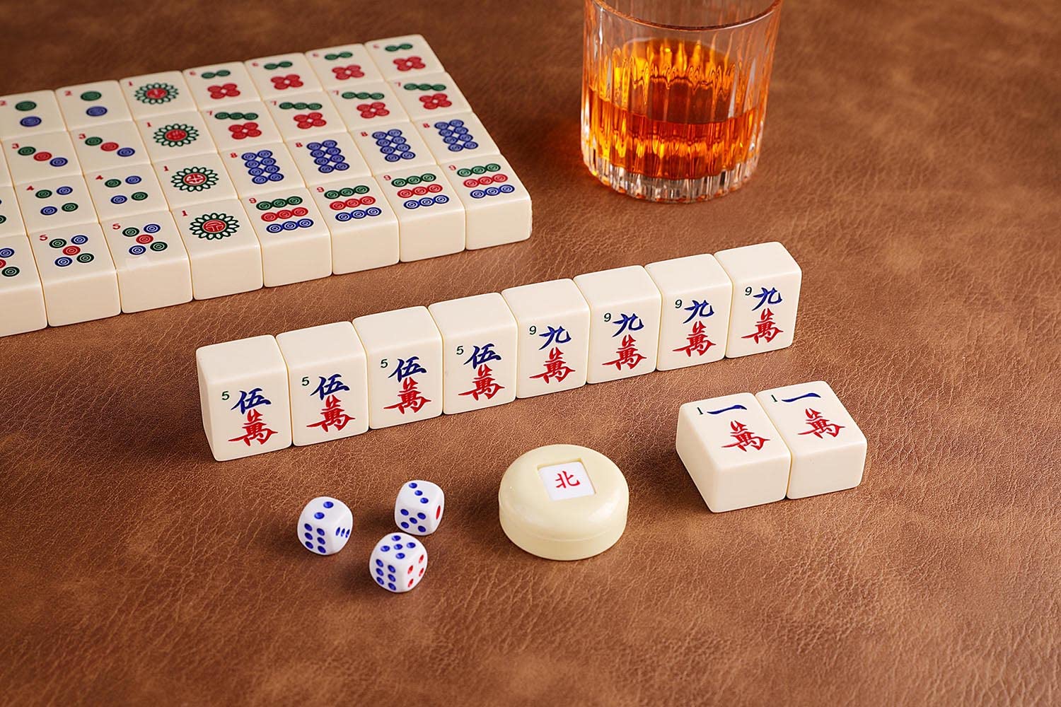Mose Cafolo tiles organized in travel trays and case