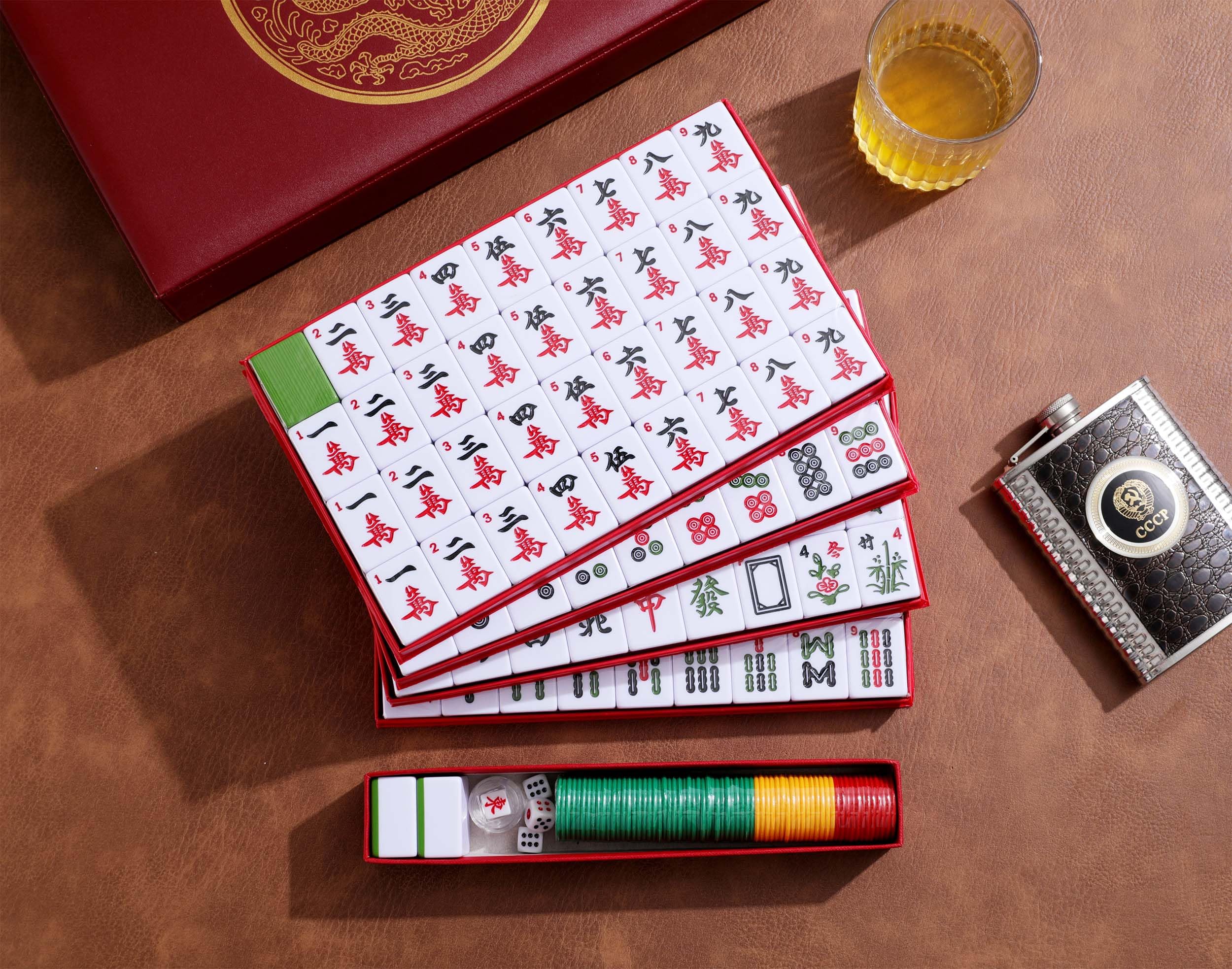 Mose Cafolo mahjong tiles showing Arabic numbers and Chinese characters
