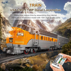 Mould King 12018 EMD F7 locomotive motor with remote control setup.