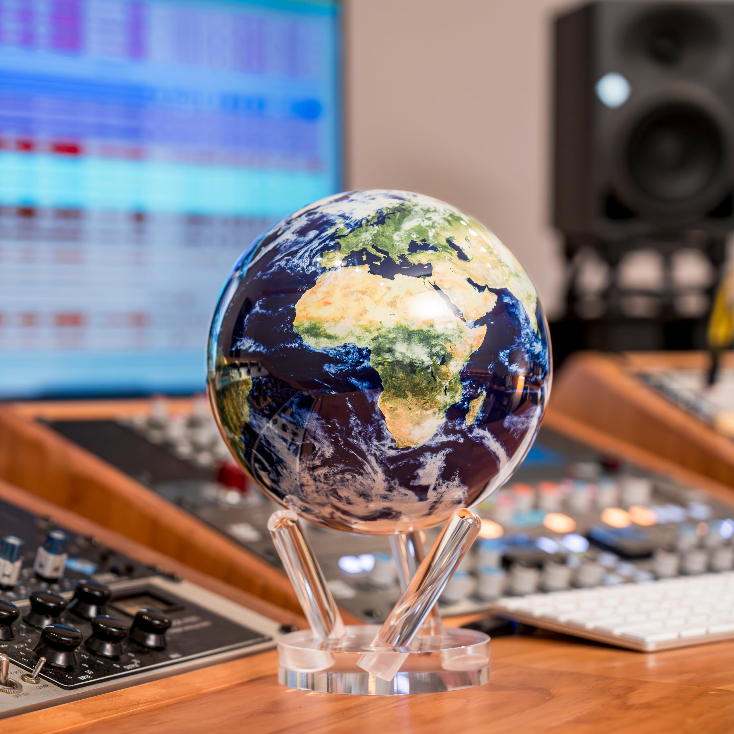 MOVA Globe ambient-light powered rotates under soft lighting.