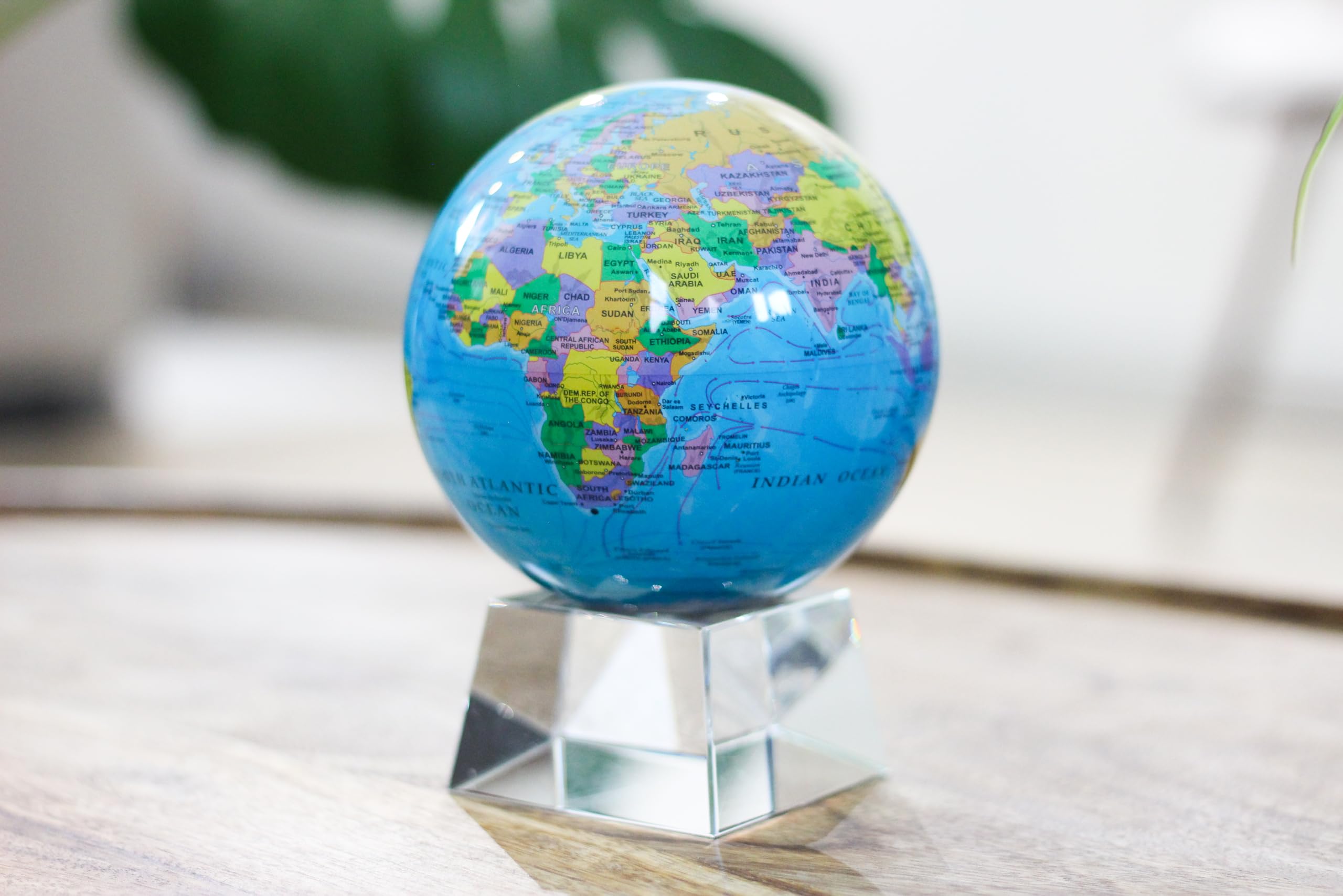 MOVA Globe blue desk display on minimalist stand suitable for workspaces
