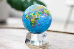 MOVA Globe blue desk display on minimalist stand suitable for workspaces
