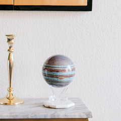 MOVA Jupiter Globe 6-inch desk centerpiece in a modern workspace