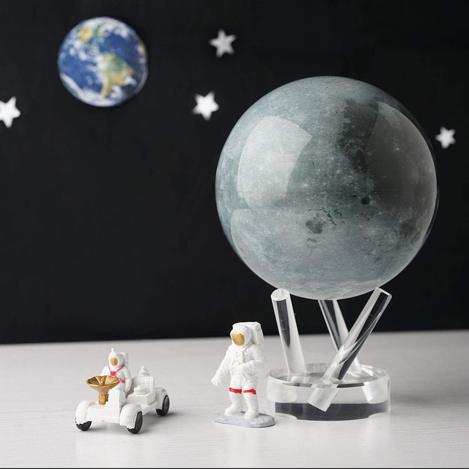 MOVA Moon Globe 6-inch ambient-light motion showcases quiet office rotation.