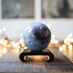 MOVA Moon Globe 6-inch clear-shell design enhances modern shelves.