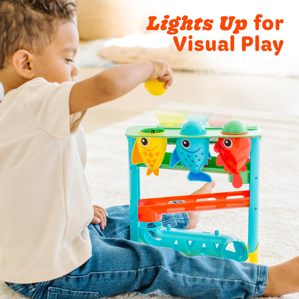 Move2Play Feed The Fish: kid-friendly ball drop promotes motor play.