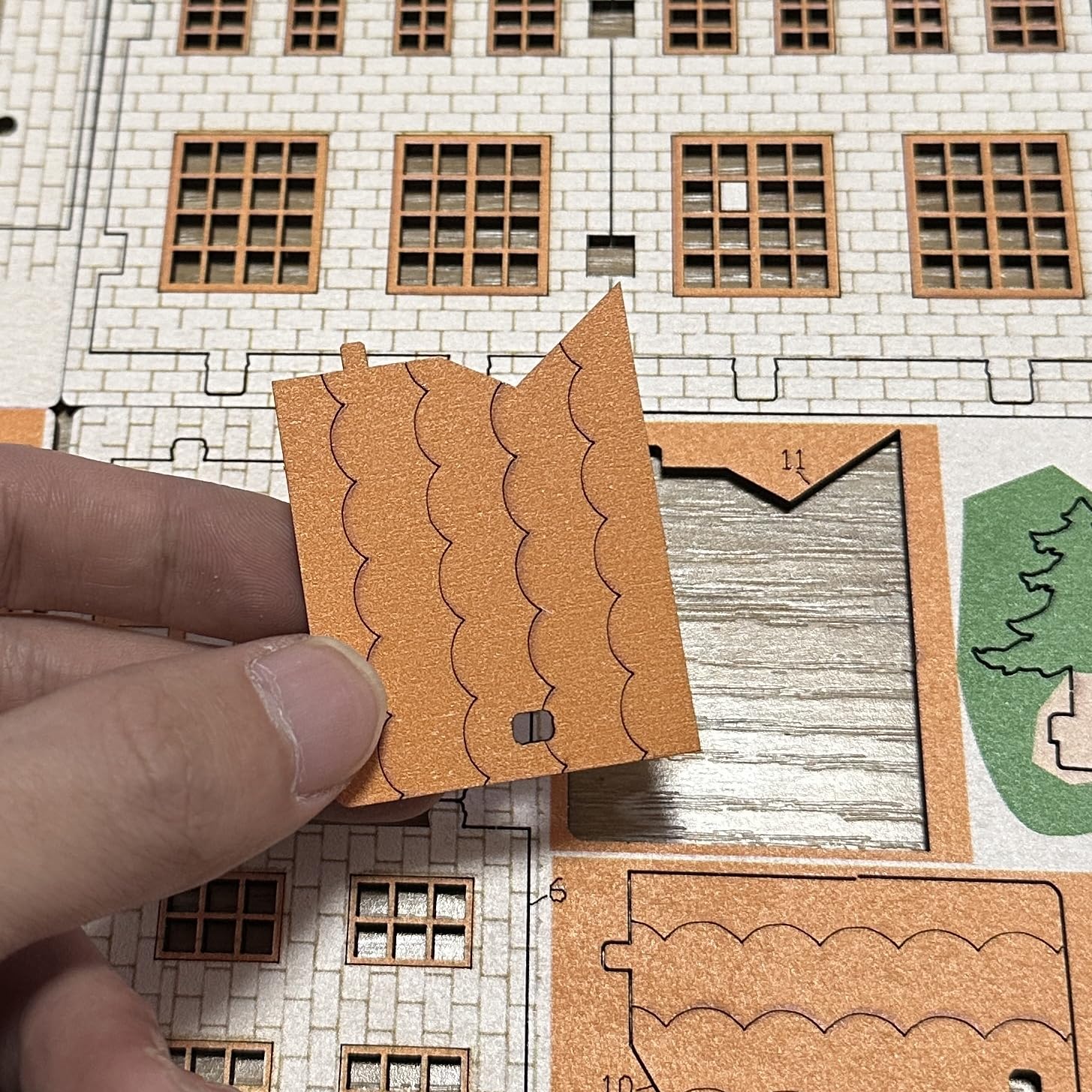 MPIUET Yellow House 9-in-1 unboxed layout shows preparation for DIY project