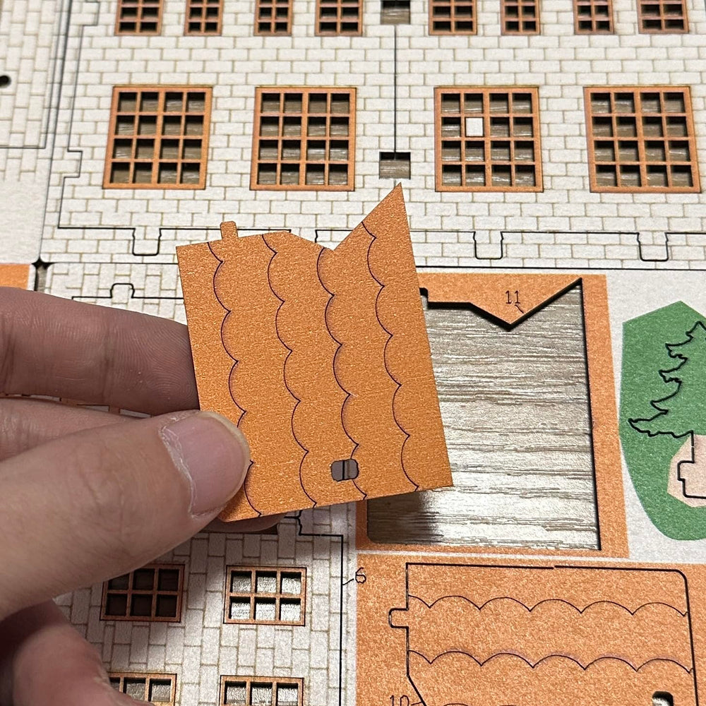 MPIUET Yellow House 9-in-1 unboxed layout shows preparation for DIY project