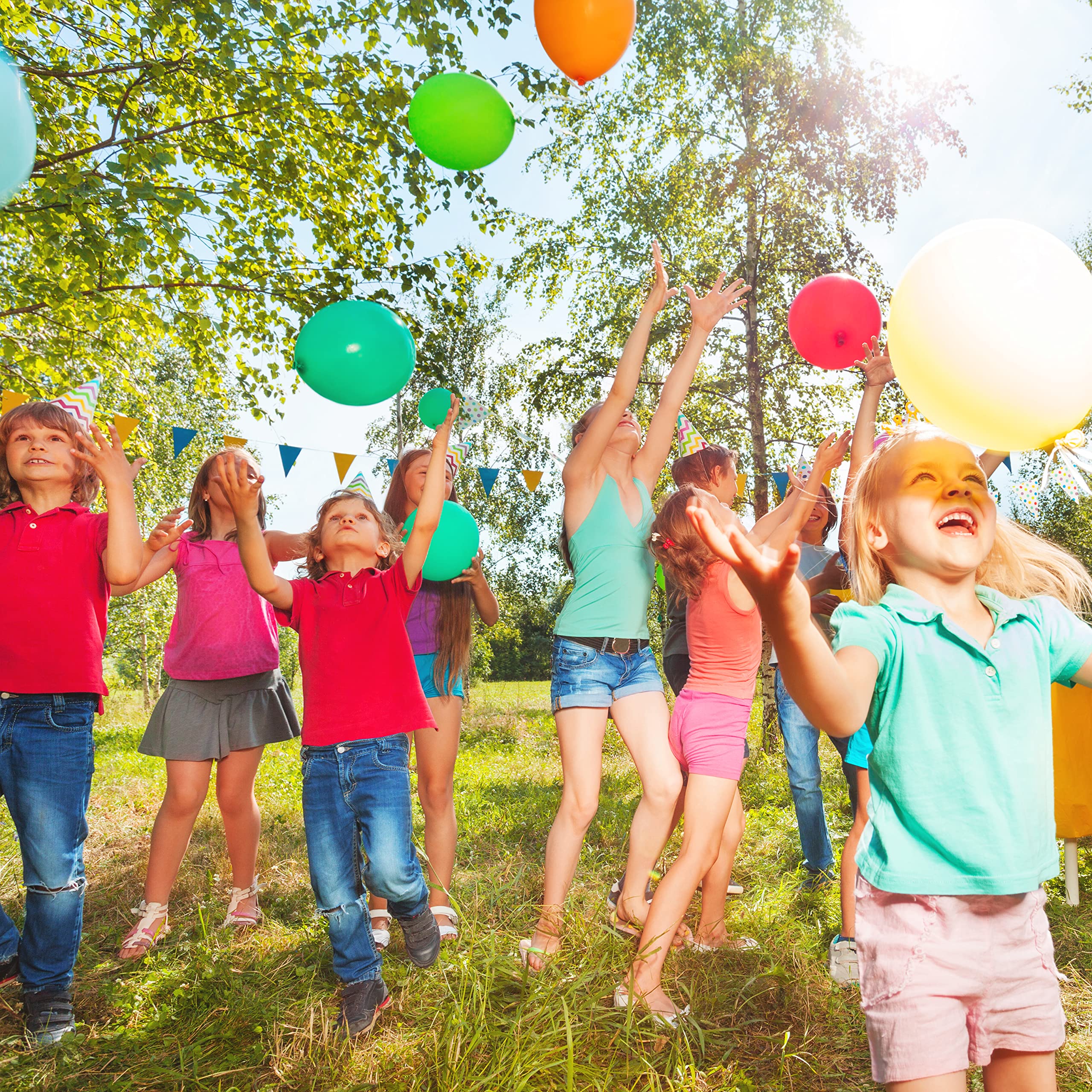 Bright party decorations with Mr. Pen balloons for photos.