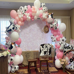 Msiveavz large cow-print latex balloons as focal points for centerpieces