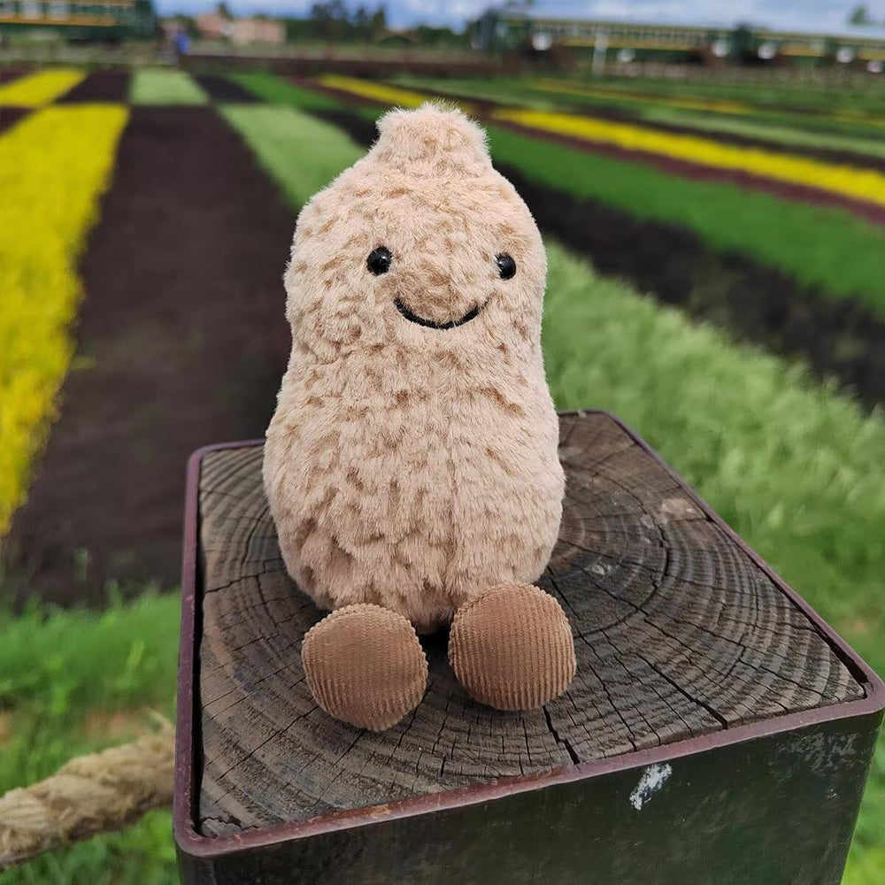MUALML travel-friendly peanut plush, portable bag accessory on the go.