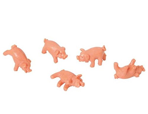 Muba Piglet dice landing poses on table for playful rounds.