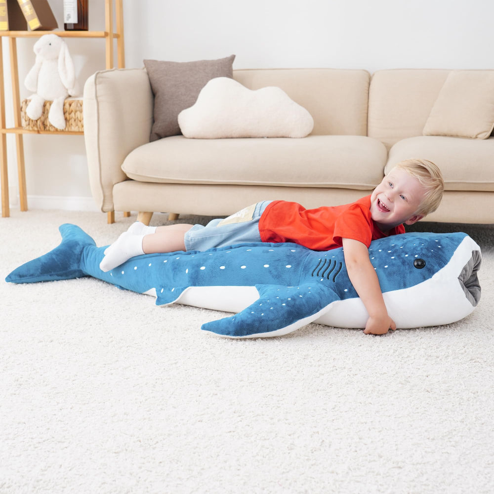 Mukouxun whale doll adds charming bedroom decor and playful ambiance.