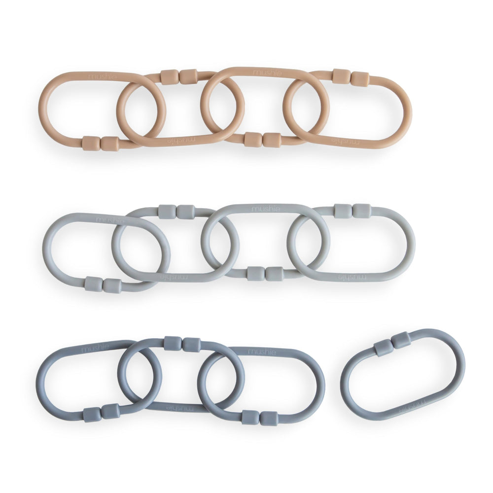 Mushie Chain Link Rings natural close-up; easy stroller attachment for on-the-go play