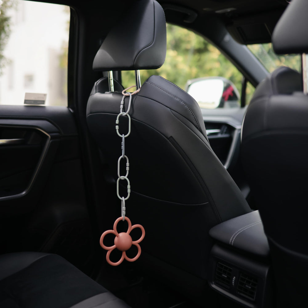 Mushie Chain Link Rings care wash with mild soap and warm water