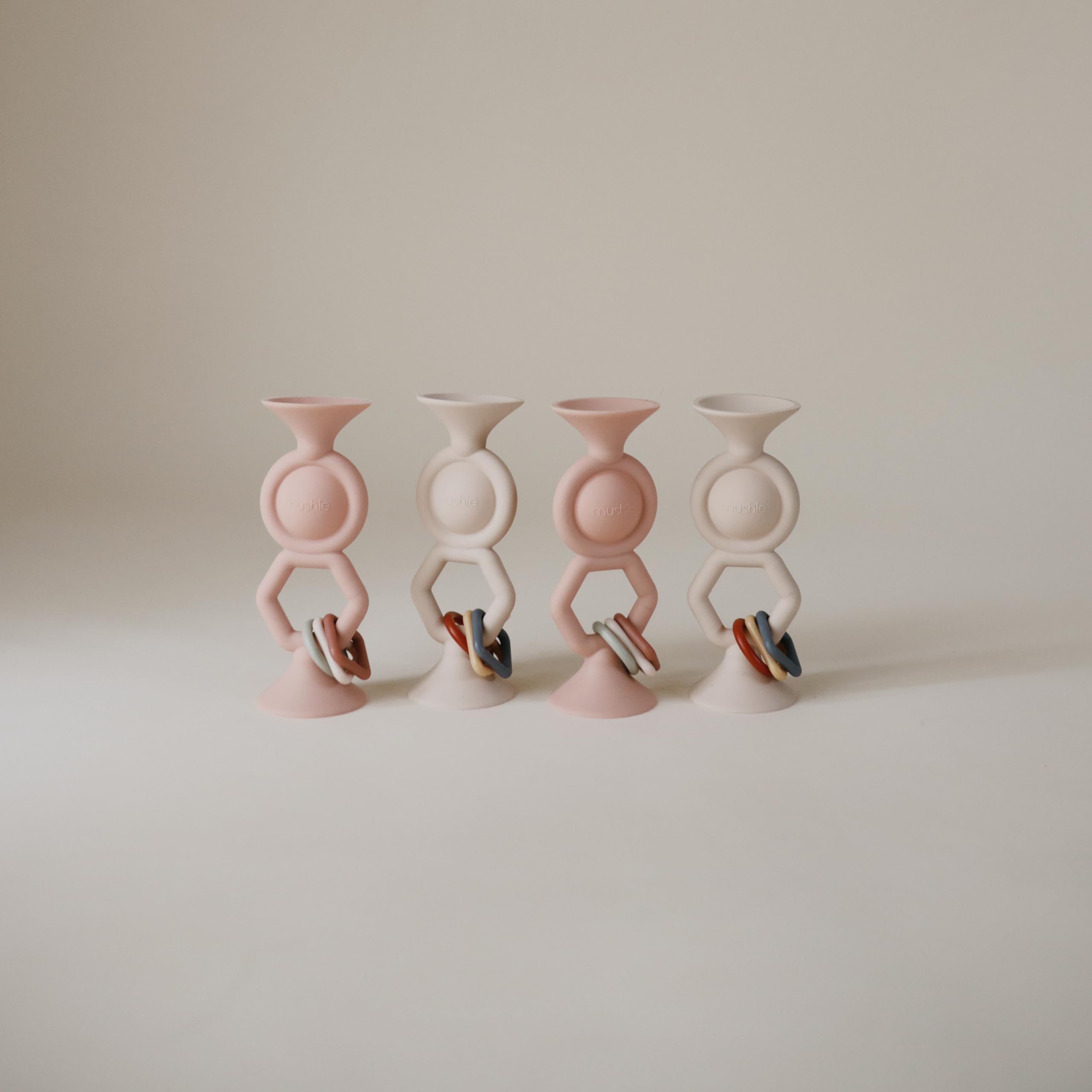 Mushie HexaPop plush plastic charms for tactile interaction