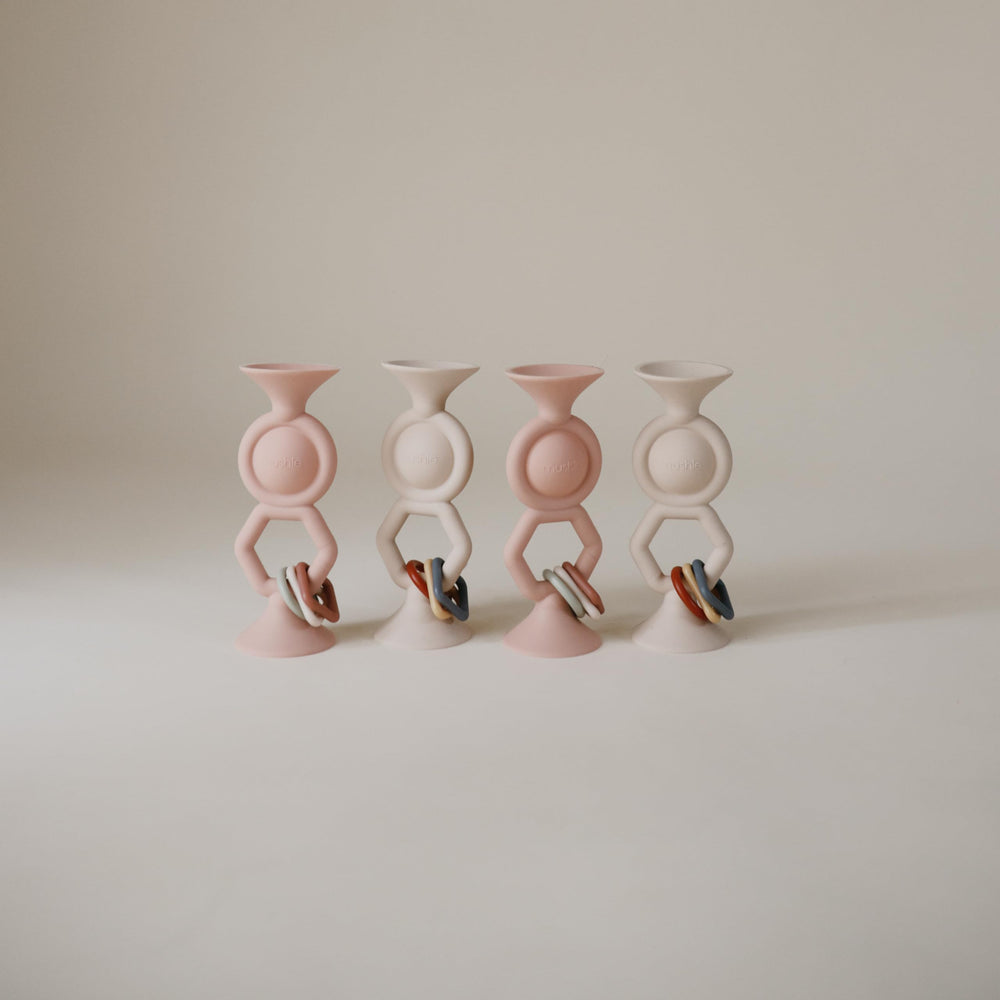 Mushie HexaPop plush plastic charms for tactile interaction