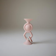 Mushie HexaPop suction toy bottom cups grip a table for steady play